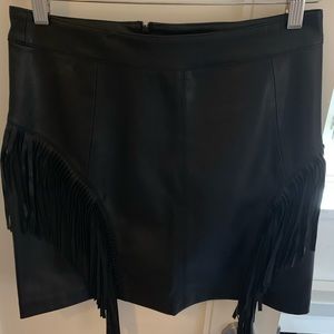 Black faux leather skirt with fringe